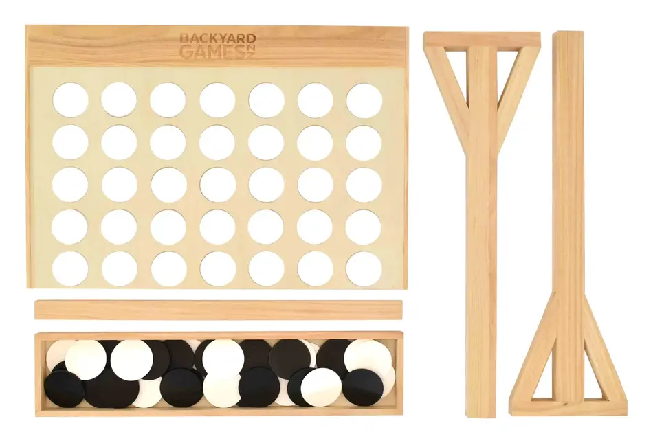 The giant Connect 4 taken apart into its board, two legs, a brace and a tray of black and white discs.